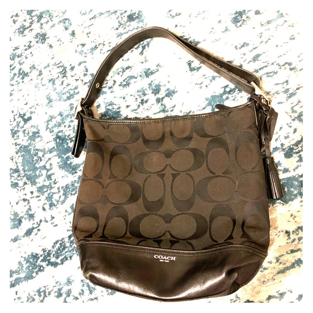 Medium sized gently used hobo bag.